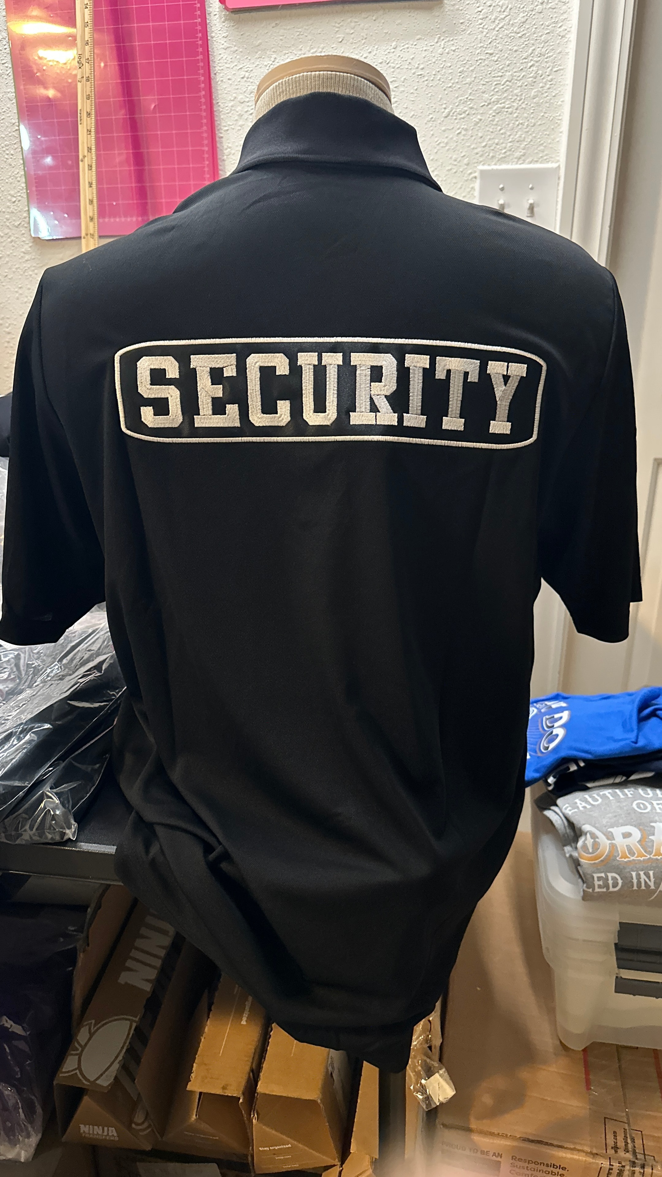Security Polo — Back Embroidery